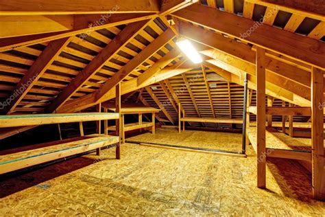 Empty attic with storage shelves Stock Photo by ©iriana88w 50725379