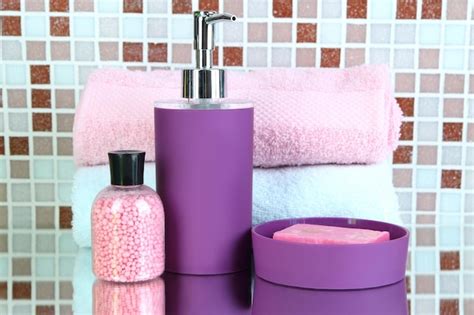Premium Photo | Cosmetics and bath accessories on mosaic tiles background