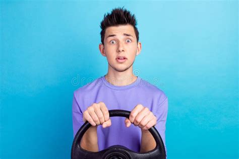 Photo of Surprise Stare Blond Hair Man Hold Wheel Isolated on Blue Color Background Stock Image ...