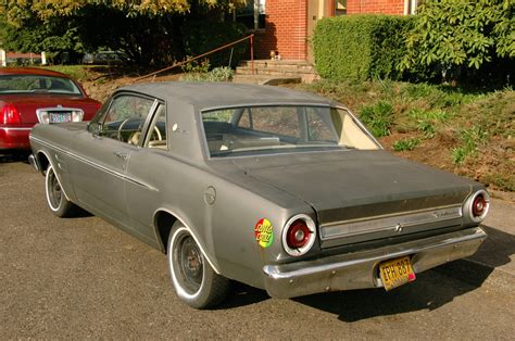 OLD PARKED CARS.: 1967 Ford Falcon Futura Sports Coupe.