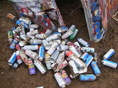 Paint Can Pile | Empty paint cans once used to paint the Cad… | Flickr