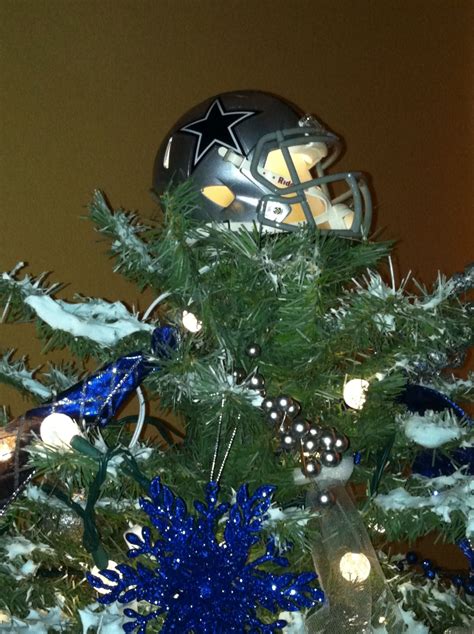 Dallas Cowboy Christmas tree topper...took a mini helmet and added a ...