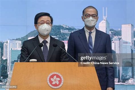 Hong Kong Chief Executive John Lee Ka-chiu and Lo Chung-mau,... News Photo - Getty Images