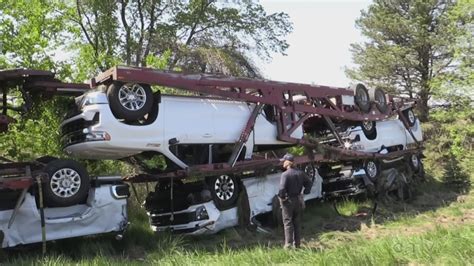 Truck hauler flips in 401 crash