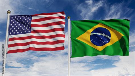 Illustrazione Stock American and Brazilian flags over blue sky. Concept ...