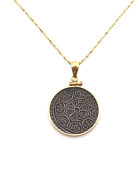 Lot - 18K YELLOW GOLD BEZEL COIN PENDANT NECKLACE