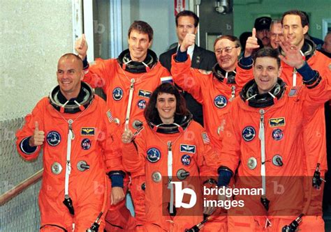 Image of The crew of the space shuttle Endeavour depart from their