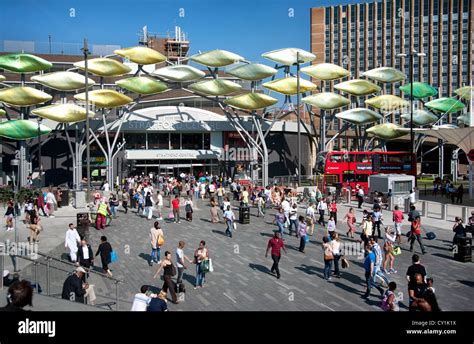 England. London. Crowds of people outside Stratford Shopping Centre showing the 'Stratford Shoal ...