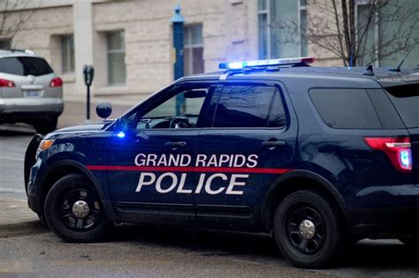 Grand Rapids police continue to negotiate with armed intruder after ...