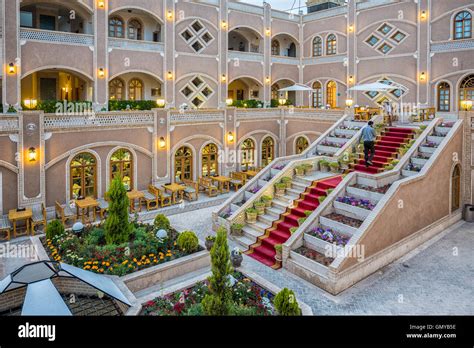 Courtyard and restaurant of the Dad Hotel in Yazd, Iran Stock Photo ...