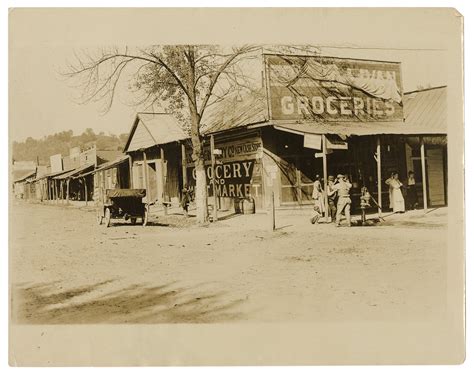 Lot Detail - [KENTUCKY]. Louisa, KY grocery storefront photograph. Circa...