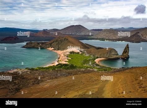 View from atop the volcano of Bartolome Island, looking down at ...