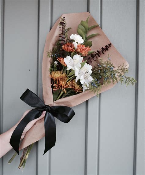 Small flower bouquet arrangement/ brown craft paper wrapping/ black bow/ neutral / eucalyptus a ...