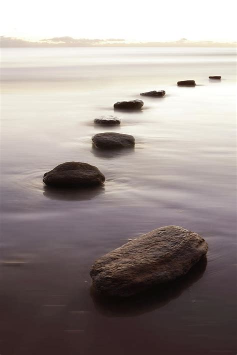 Stepping Stones In Water Photograph by Peter Cade | Fine Art America