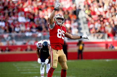 Download George Kittle Catching a Pass Wallpaper | Wallpapers.com