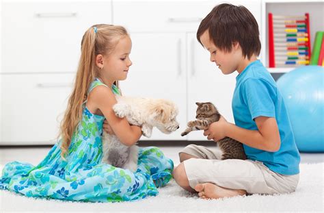 Kids with their pets - dog and cat - Montessori Academy of Cincinnati