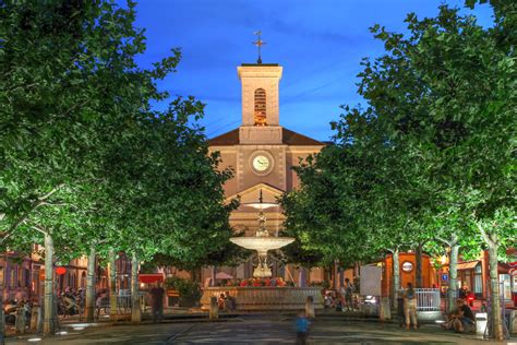 Night scene in Place de Marche, Carouge, Geneva, Switzerland with the ...