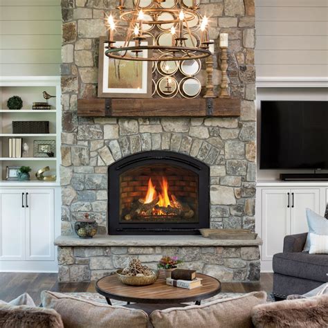 Trend Watch: Soft Lines | Indoor gas fireplace, Gas fireplace ideas living rooms, Cottage fireplace