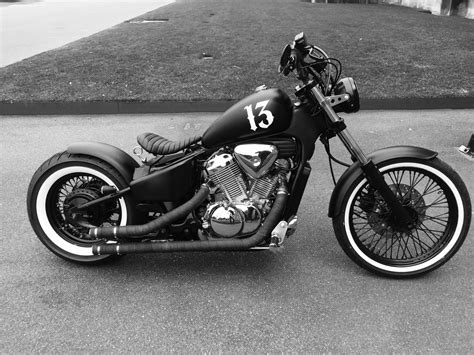 a black and white photo of a motorcycle