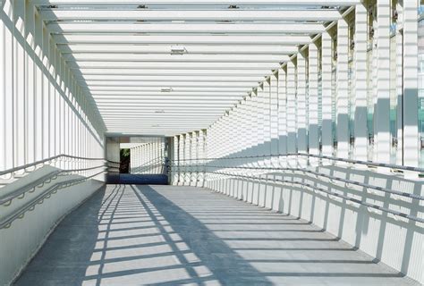 SKYWALK, covered urban bridge for pedestrians and bicyclists by Bulant ...