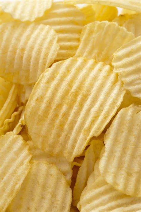 ridged potato chips as background - Free Stock Image