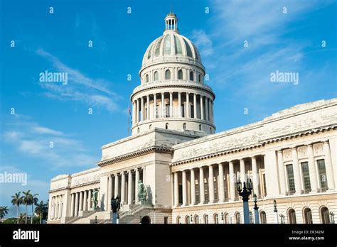 The classic architecture of the Capitolio building stands under bright ...