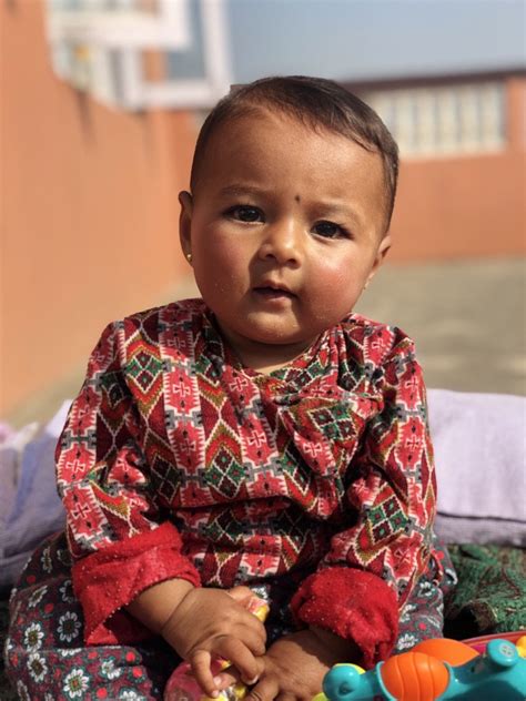 My Nepali friend's baby being extraordinary photogenic, this morning ...