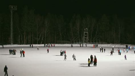 Ice Skating Rink At Night (04). The Open Ice Skating Rink With Crowd Of Young People At Night ...