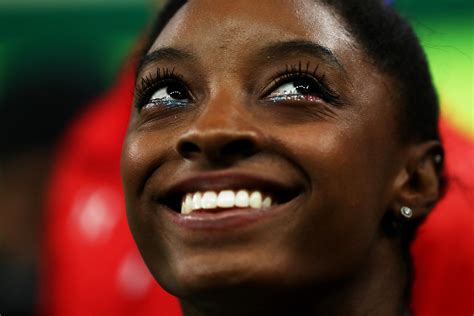 U.S. Gymnast Simone Biles Wins a Team USA Gold Medal While Rocking ...