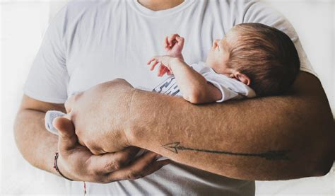 Photo Of Person Carrying Newborn Baby · Free Stock Photo