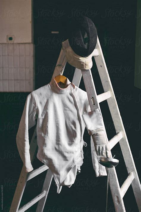 "Fencing Equipment" by Stocksy Contributor "Lumina" - Stocksy