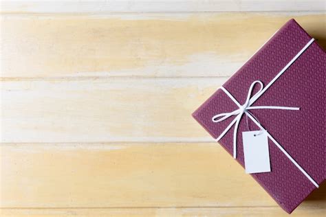 Premium Photo | Red gift box, ribbon bundle