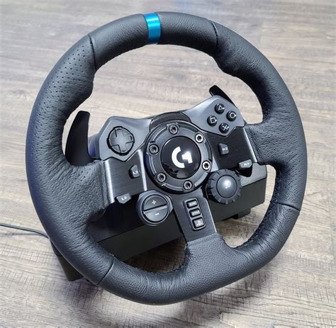 For sale is a gently used Logitech G923 steering wheel with the manual ...