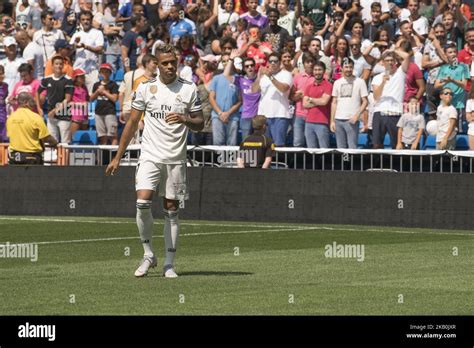 Mariano Diaz Mejia reacts on the pitch after being announced as a Real Madrid player at Santiago ...