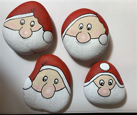 Santa painted rocks | Stone painting, Painted rocks, Christmas crafts