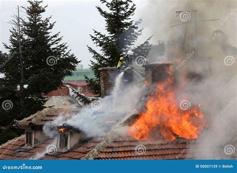 Firefighters burning house editorial stock image. Image of services - 50007139