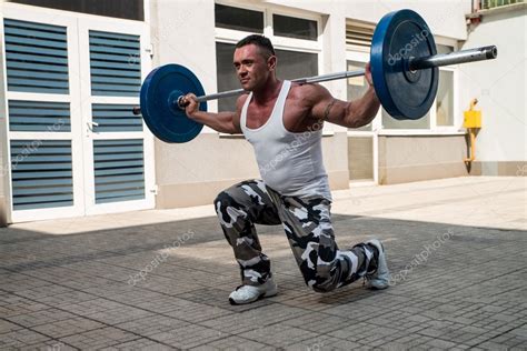 Gym Workout with Barbell Lunge — Stock Photo © ibrak #32175447