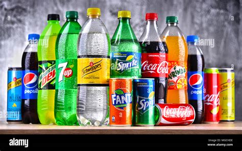 POZNAN, POLAND - APR 6, 2018: Bottles of global soft drink brands including products of Coca ...