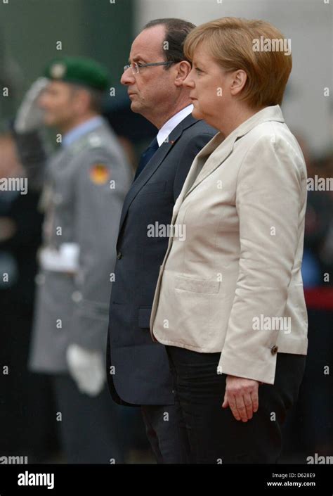 German Chancellor Angela Merkel (CDU) welcomes new French President ...