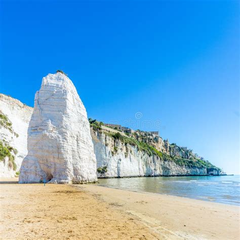 View Beach of Vieste with Pizzomunno Rock, Gargano Coast, Apulia, South of Italy Stock Image ...