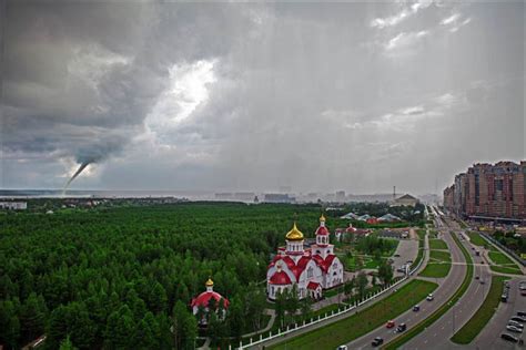 Double tornado strike over Siberia, sparking fear from a crane driver - and children