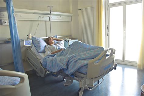Photo of Woman Lying in Hospital Bed · Free Stock Photo