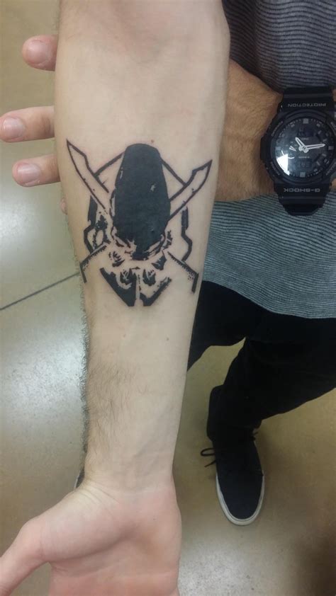 Halo Legendary Symbol done by Justin at Psychward Tattoo, North Dakota : tattoos