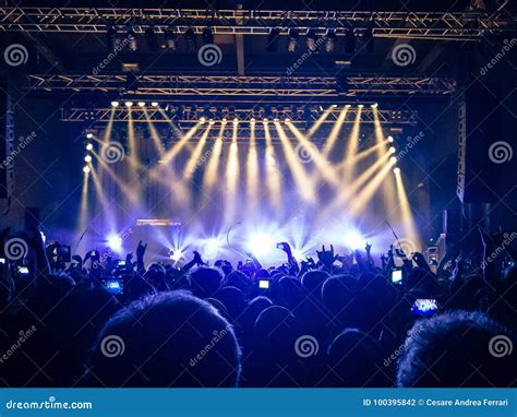 Concert Crowd in Front of Stage Lights Editorial Photography - Image of ...