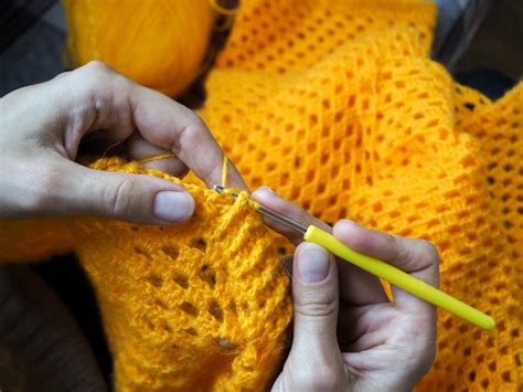 Premium Photo | Crochet. woman crochet yellow yarn