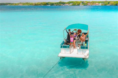 Full day tour to BACALAR Seven Colors Lagoon, Cenotes and Sujuyha Clay Park Mexico