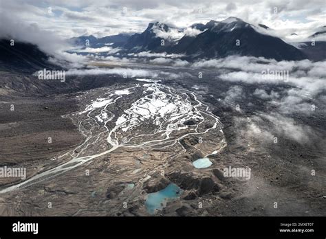 The tongue of Tupermit Glacier in Akshayuk Pass. Auyuittuq National Park, Baffin Island, Canada ...