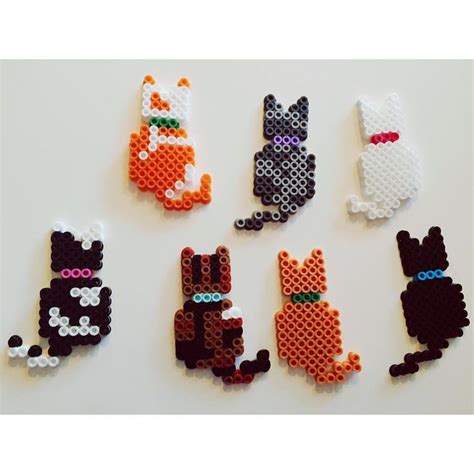 Find this Pin and more on Strijkkralen. Cats perler beads by lexiscraftstuff | Perler beads ...