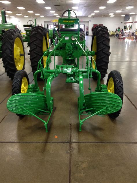 Old John Deere Plow known as a one way plow. Most oftrn used to plow irrigated fields because it ...