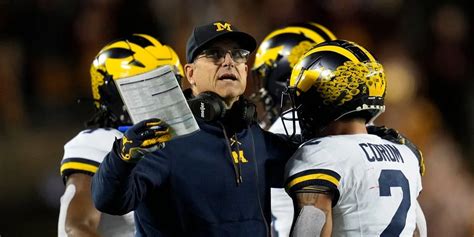 NCAA PANEL: Michigan Wolverines’ head coach Jim Harbaugh is